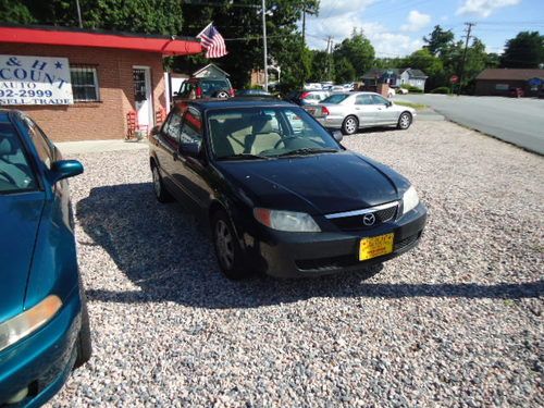 2002 mazda protege lx sedan 4-door 2.0l parts car ! automatic is good  north car