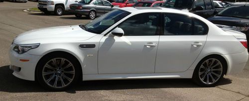 2009 bmw - m5 - only 8,800 made. original msrp $100k. we finance