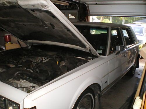 1989 white lincoln town car with cranberry leather half top and interior