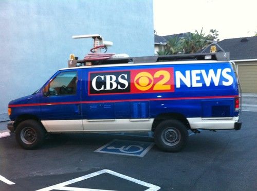 Broadcast news van with microwave mast channel 2 newsvan