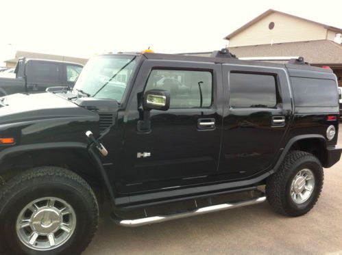 Black h2, loaded, power everything, navigation, rear dvd, heated leather