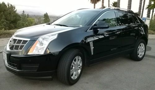 Black cadillac srx 3.6l fully loaded, great condition!