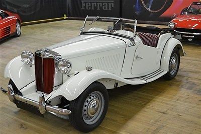 52 td midget ivory