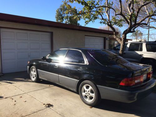 1997 Lexus ES 300. Black, w/ blk leather int., power windows, locks and seats., image 2