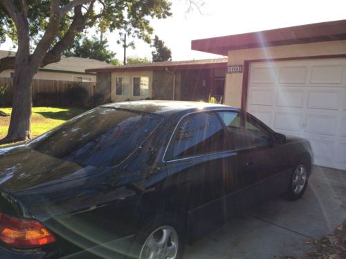 1997 Lexus ES 300. Black, w/ blk leather int., power windows, locks and seats., image 3