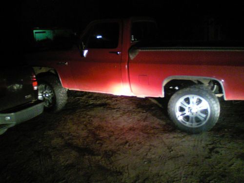 1985 4x4 gmc high sierra  red in color   driven daily