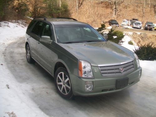 2004 cadillac srx sport utility 4-door 4.6l luxury awd seats 7 2 dvd players nav