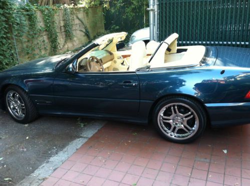 Excellent condition, aqua with beige leather interior, new beige soft top,