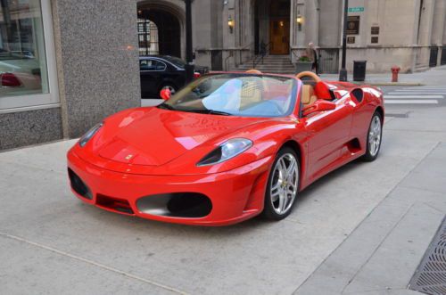 Rosso corsa with tan daytona seats only 6k miles call roland kantor 847-343-2721