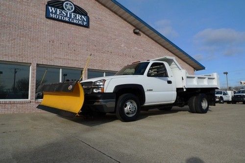 Low miles! 2004 dump 4x4 plow delivery available