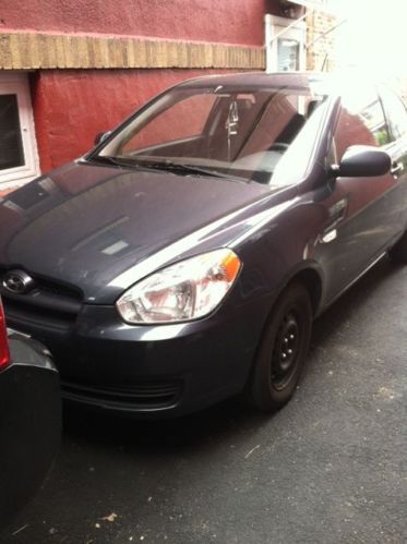 2011 accent 2 door coup...cute fast and cheap on fuel