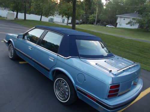 1992 cutlass ciera - 79,000 miles - cold a/c - mock convertible top - great car