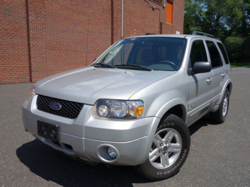 Ford escape hybrid 4wd gas saver leather brand new tires autocheck no reserve
