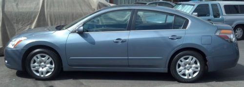 2010 nissan altima with only 59,323 miles. 4 door, 2.5l 4 cylinder car.