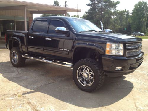 Beautiful black southern comfort  crew cab 4wd tan leather back up custom wheels