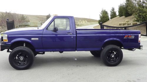 Ford f250 fx4  5-speed 8' bed custom 18" wheels &amp; paint, lifted, new tires