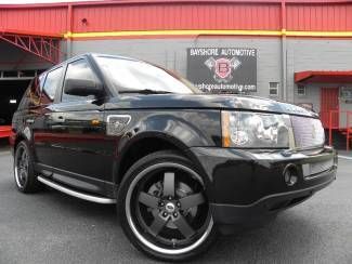 Strut grill/vents*black/tan*22" wheels*dvd*nav*carfax cert*we finance/trade*fla