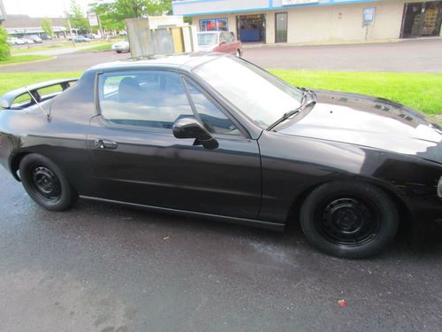 97 black honda del sol 163k targo top 15in rims power ac is good automatic