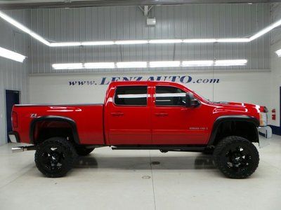 Crew-short ltz 6.6l diesel lmm lift z71 4wd tv/dvd we finance