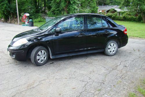 2009 nissan versa 1.6 base sedan 4-door 1.6l black