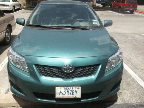 2009 gently driven toyota corolla  14,171 original miles!!!!   must see