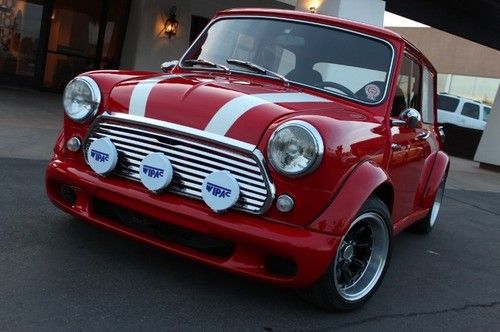 1969 mini cooper. fully custom. vtec b16 honda drivetrain. too much to list.