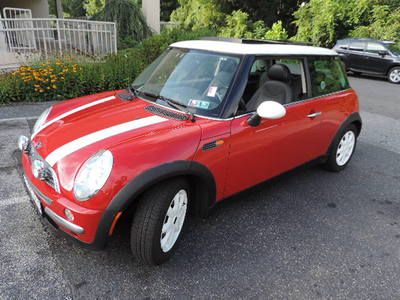 2003 mini-cooper, no reserve, looks and runs fine, moonroof, leather.