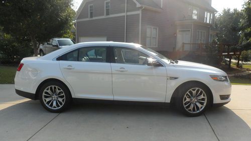 2013 ford taurus; flex fuel; limited; white w/ beige int. excellent condition