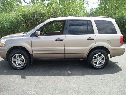 2004 honda pilot ex 4x4 awd very clean runs and drives great low miles