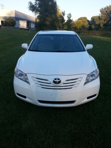 2009 toyota camry le sedan. kbb value $14,263.00