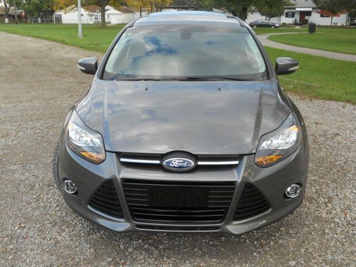 2012 ford focus titanium hatchback  2.0l/no reserve/flex flue/navi/lthr/rebuilt