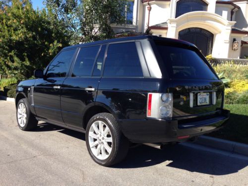 2007 land rover range rover supercharged black w/black int. low miles rear dvd