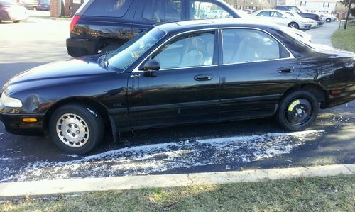 1997 mazda 626 dx sedan 4-door 2.0l