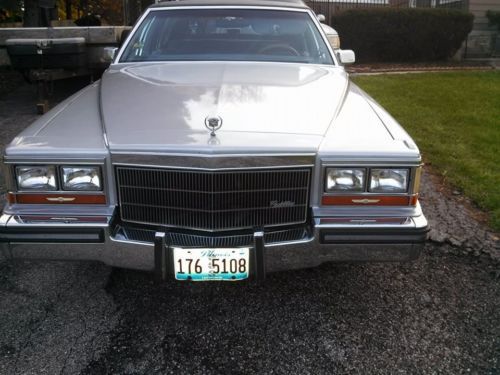 1986 cadillac fleetwood brougham - silver....smooth ride!!