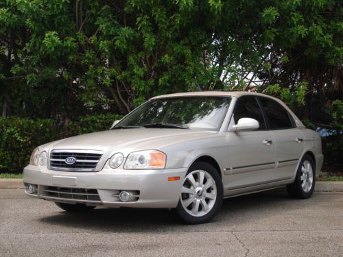 Low mile - lx v6 - sequential sport shift - leather - sunroof - carriage top!