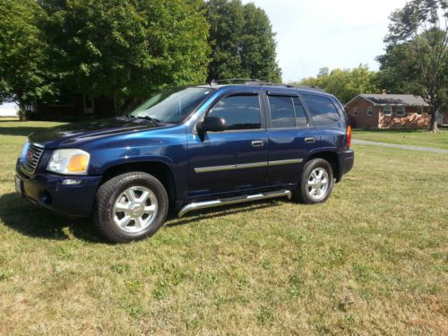 4wd envoy with build in dvd player and two wireless head sets great for kids