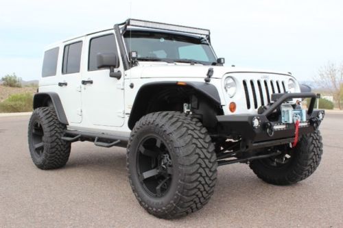 Jeep wrangler sahara 4 door 4x4 hard top unlimited
custom lifted