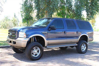 Lifted low miles eddie bauer powerstroke diesel 4x4 with fabtech lift and shocks