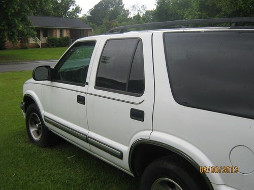 White blazer with black trim , automatic, over 200k miles,