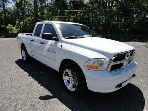 2011 ram 1500 white quad cab w/ chrome wheels