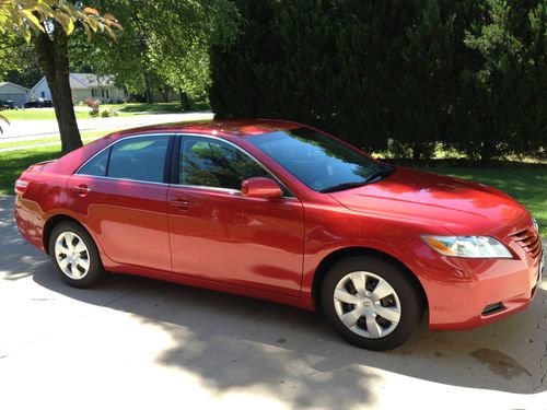 2009 toyota camry le 2.4l red - original owner, nonsmoker, excellent gas mileage