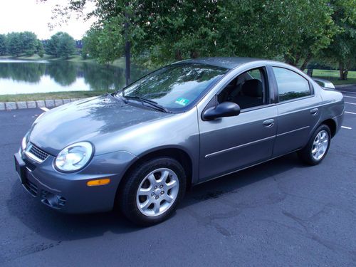 2005 dodge neon sxt sedan 4-door 2.0l / senior citizen owned, low miles!