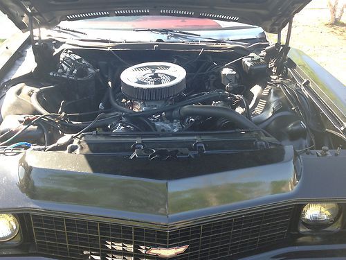 73 black custom chevy impala