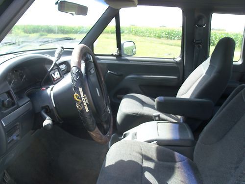 1992 Ford F150 Two wheel drive, two tone black and gray, ext. cab, image 2