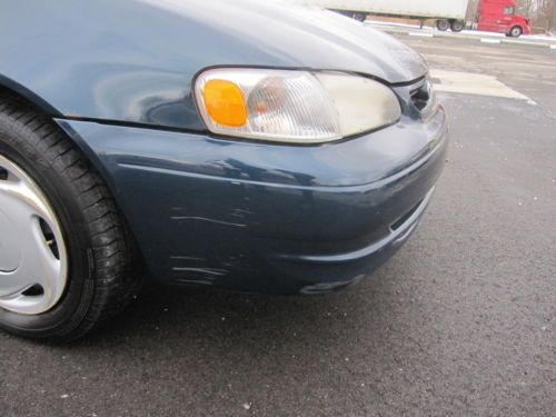 98 99 TOYOTA COROLLA LE 4DOOR . AUTOMATIC,LOW MILES 68K,GREAT ON GAS, RUNS GREAT, image 12