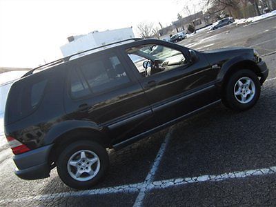 Super sharp (( black..awd..mnroof..v6..leather ))no reserve