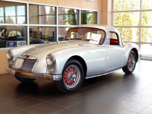 1957 mga coupe with new paint..new leather interior and carpet