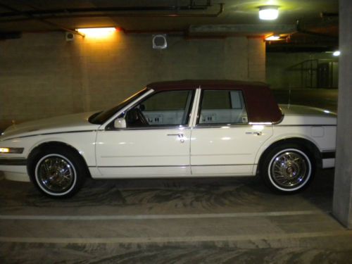 Like a showroom fresh car, this 1989 cadillac seville had only 22.5k miles. newe