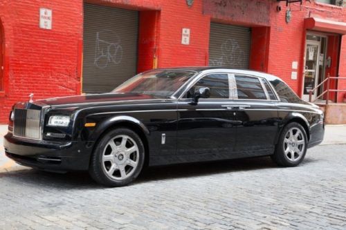 2013 rolls-royce phantom series ii in diamond black w/a moccasin &amp; black int.