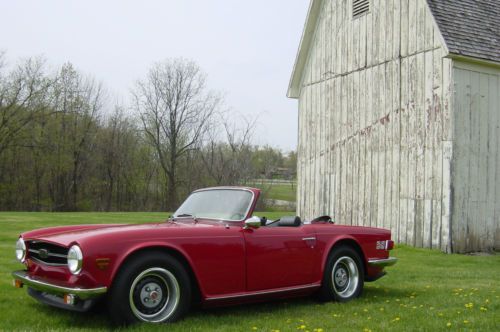 Completely restored triumph tr6 with triple webers